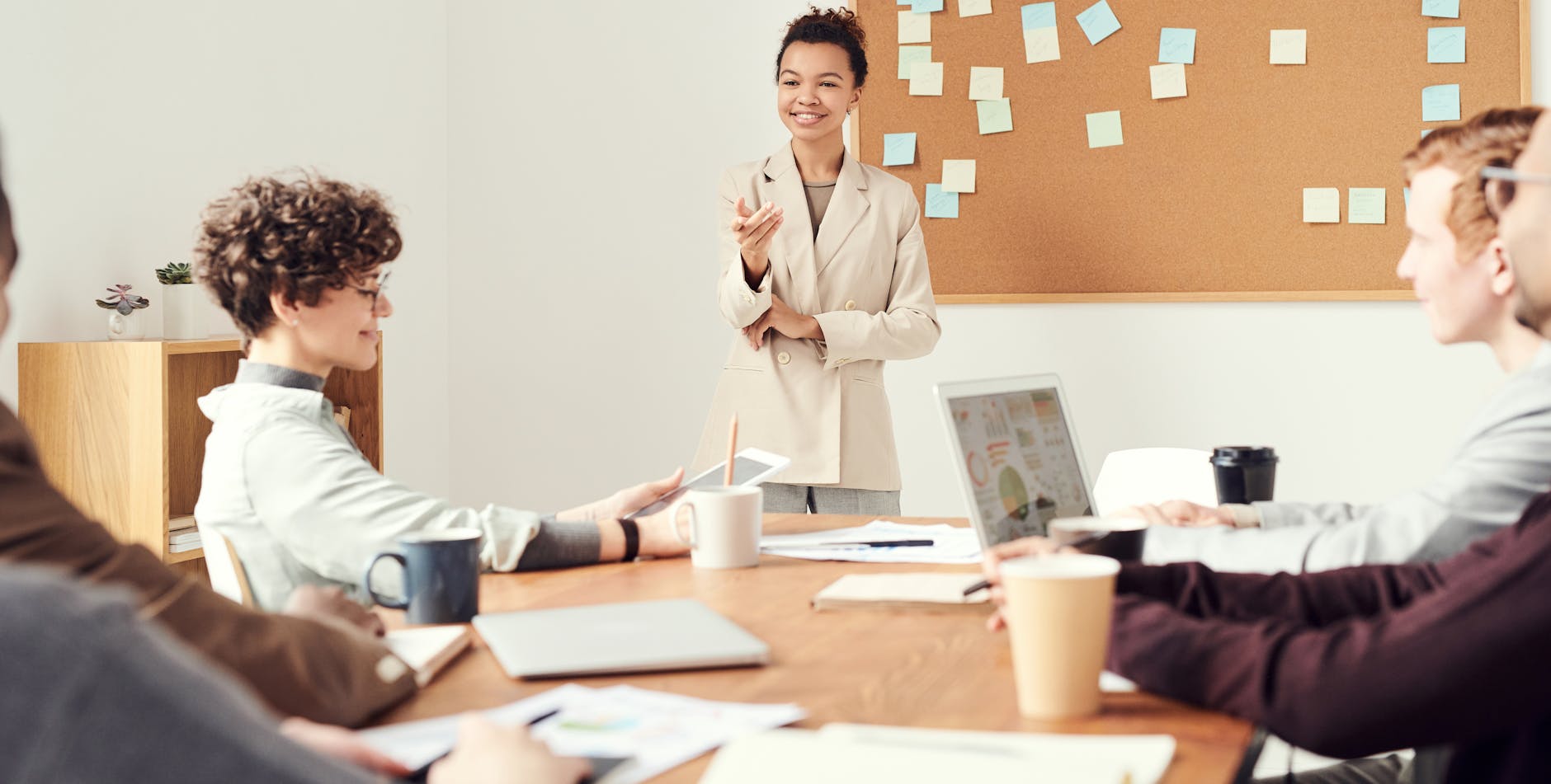 Group of people in business meeting at conference table