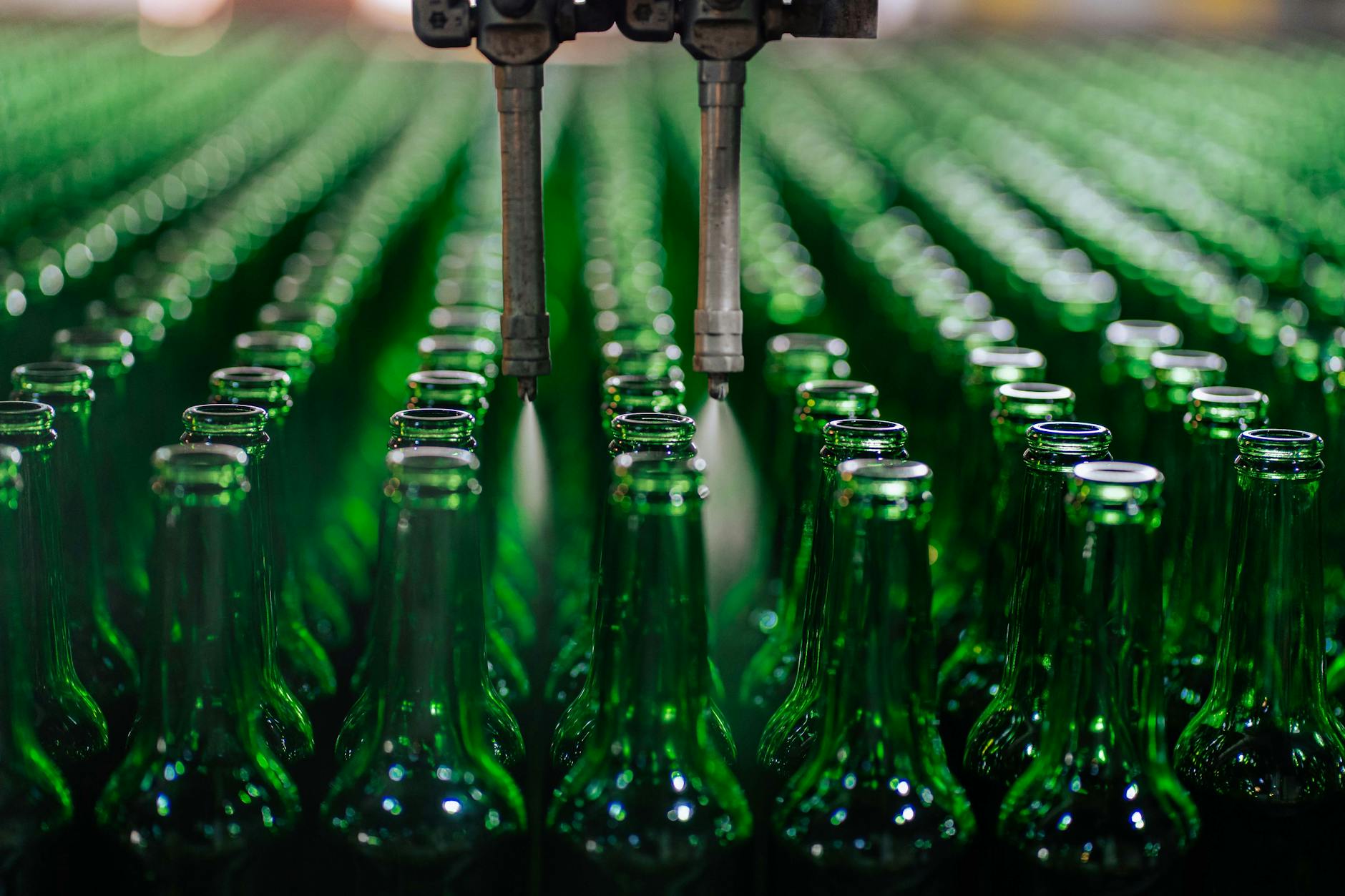 Automated production line with bottles in a manufacturing facility