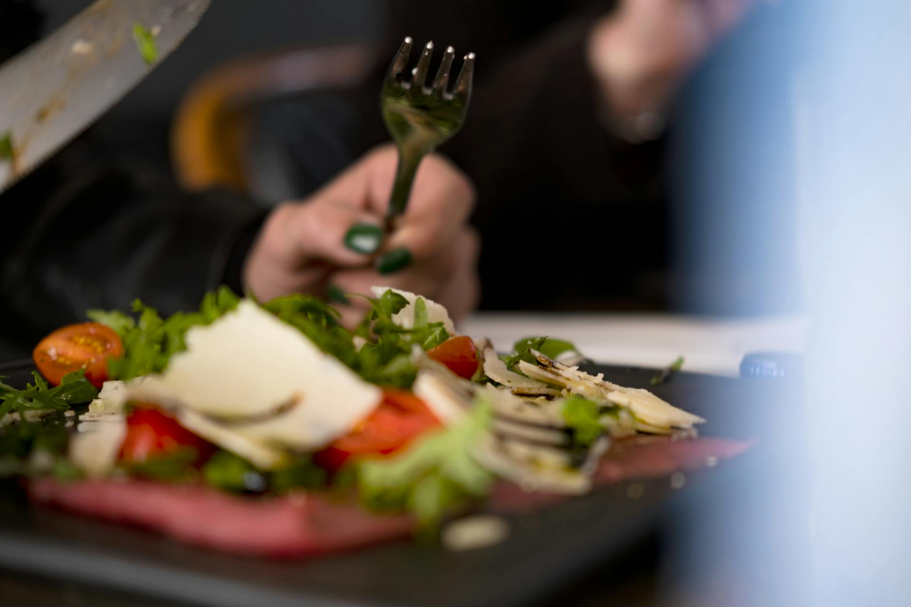 Fresh Italian salad with cherry tomatoes and cheese at a restaurant